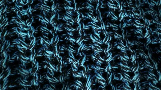羊毛质地，垂褶纺织品图案特写。羊毛纹理织物背景。细线中的可见细节，构成机织织物