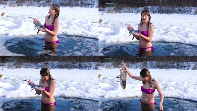 女人冬天在冰冷的水中游泳。