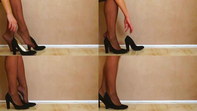 女人穿上黑色鞋子