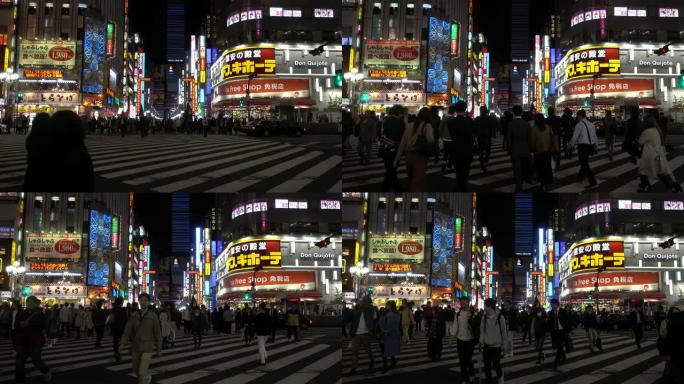 人们走过歌舞伎町哥斯拉路口的4k视频