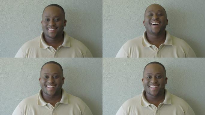 一个年轻的非洲男子大笑的头像