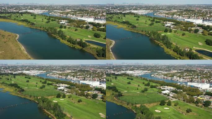 高尔夫球场、码头、城市和海洋的鸟瞰图4k
