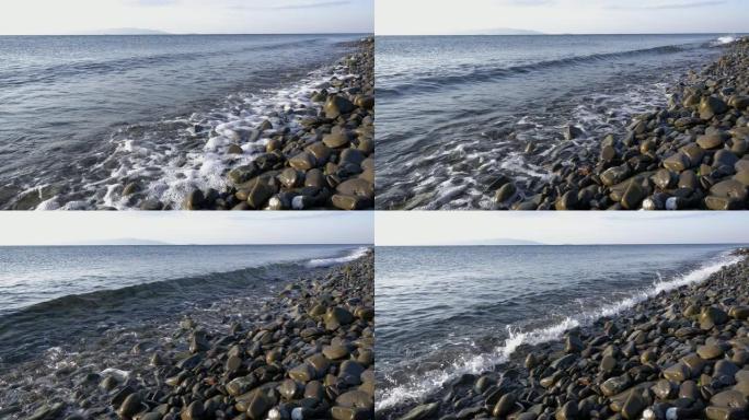 海浪在多岩石的海岸上坠毁，慢动作