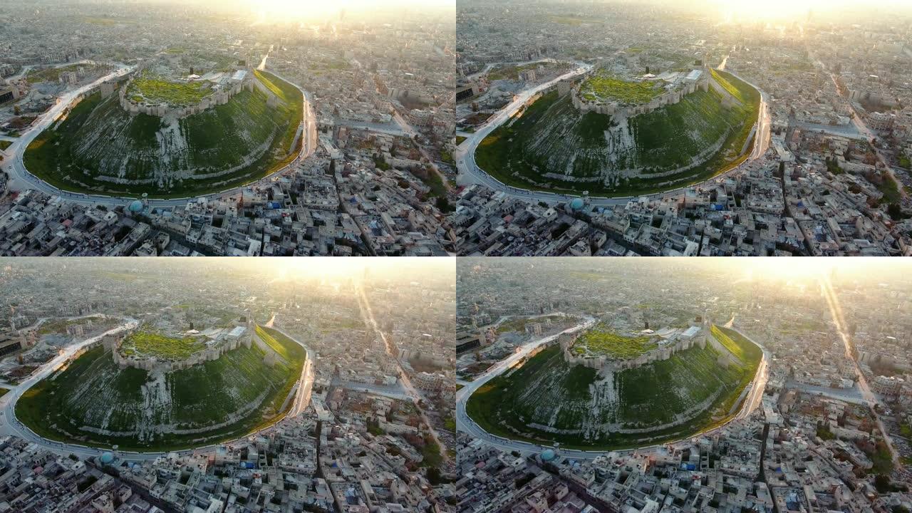 日落下美丽的阿勒颇城堡鸟瞰图。以阿勒颇城为背景的叙利亚奇妙纪念碑。