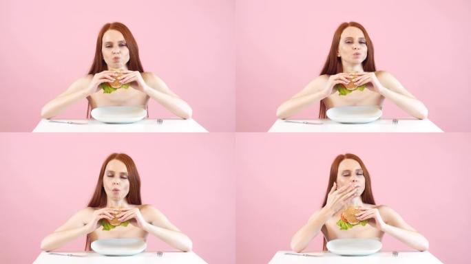 快乐的瘦女孩打破饮食，吃汉堡。违反饮食。厌食症。