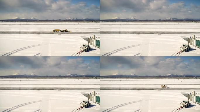 雪犁在暴风雪期间清除机场跑道和道路上的积雪