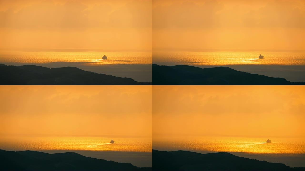 遥远的游轮剪影的时光倒流驶向希腊圣托里尼岛的日落。