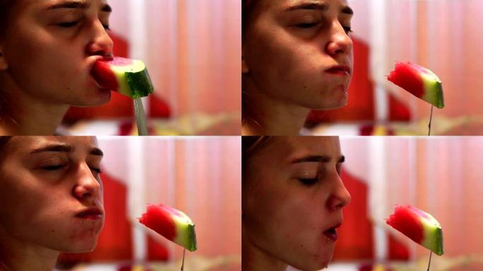 年轻女子吃一片西瓜