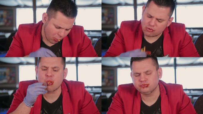 男人吃番茄酱炸薯条