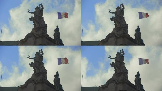法国巴黎——2014年11月11日:法国国旗和雕像在风中飘扬。法国的象征。日记账de l 'armi