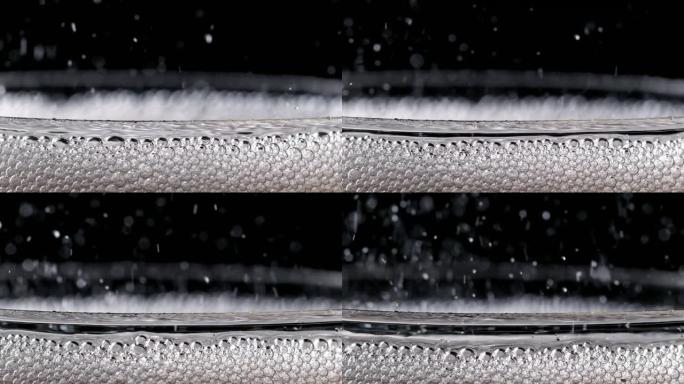 气泡汽水饮料在玻璃中嘶嘶