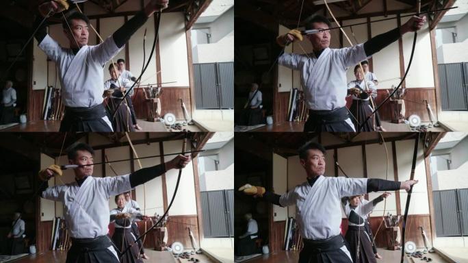 弓箭手在道场练习日本弓道的艺术