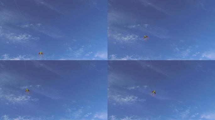 彩色风筝在蓝天高高飘扬