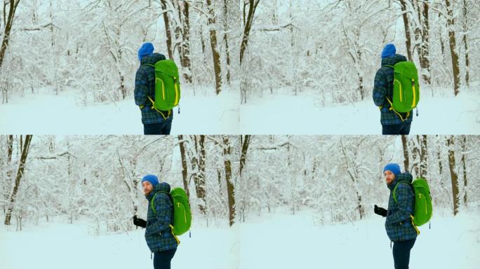 年轻人旅行者独自走过雪山。