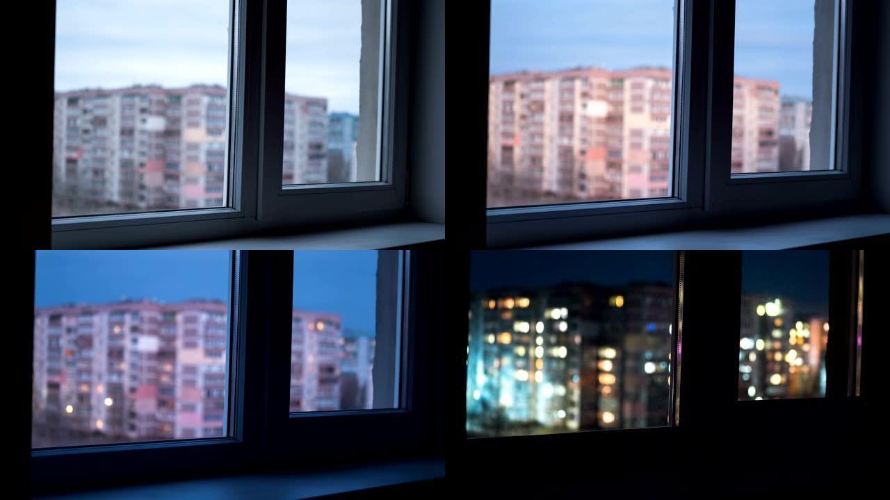 从白天到夜晚，透过窗户照亮高层建筑的窗户