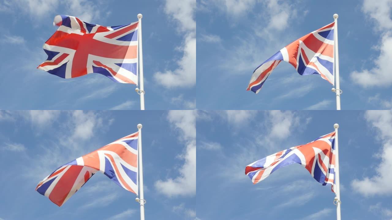 英国和英国国旗在蓝天下流动慢动作1920X1080高清镜头-英国国旗在蓝天下挥舞1080p高清视频