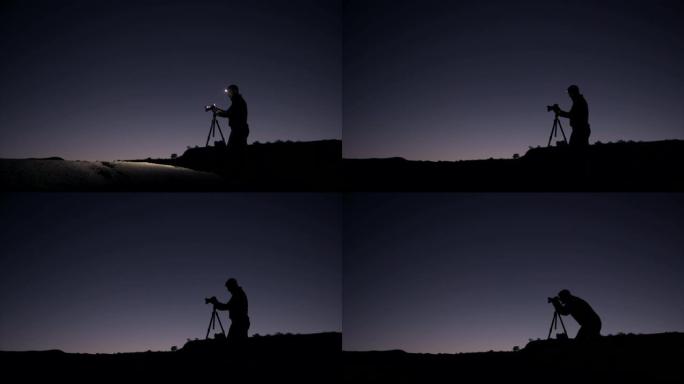 摄影师在黎明时拍照