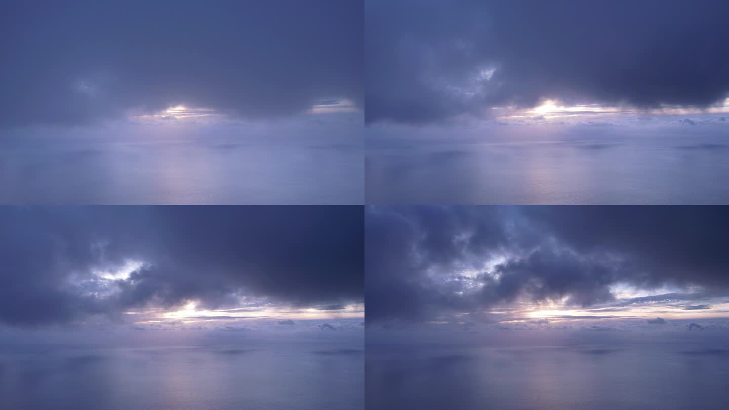 【4K航拍】云层里夕阳照射海上云变化多端