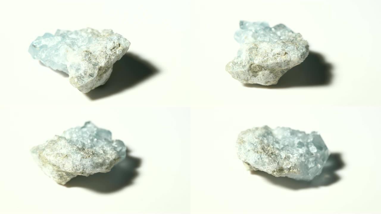 旋转白色背景的蓝晶石矿物石材样品