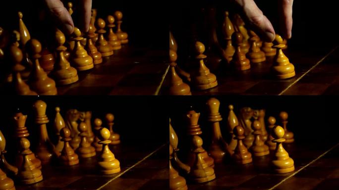 国际象棋第一步的特写。人在移动白色棋子。