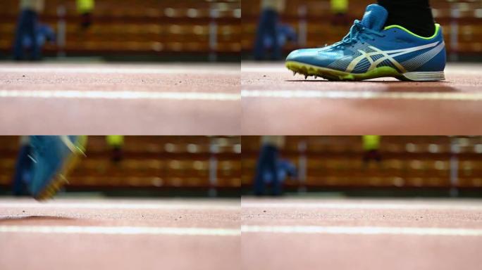 关闭穿着运动鞋的跑步者的腿的慢动作视频镜头