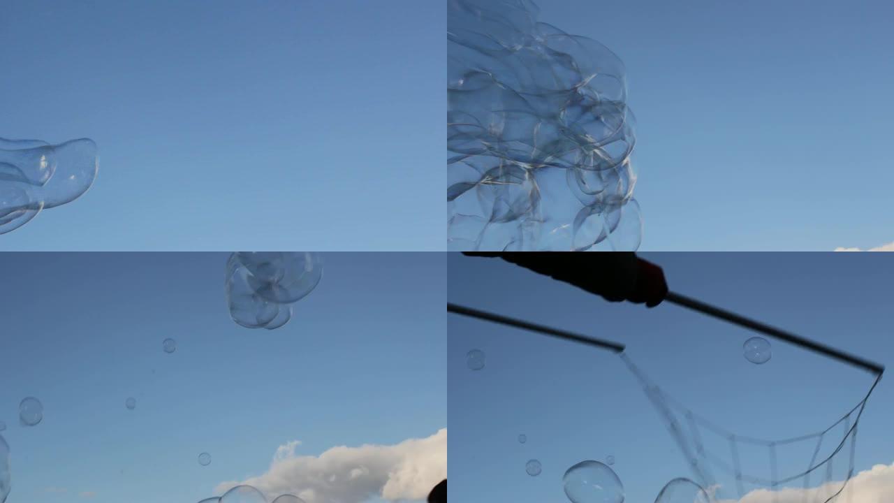 泡泡泡泡漂浮的肥皂在蓝天下飘着云