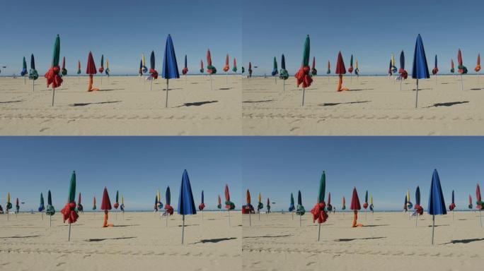 诺曼底多维尔市美丽的一天4K 2160p 30fps超高清镜头-法国海滩遮阳伞防晒慢速pan 384