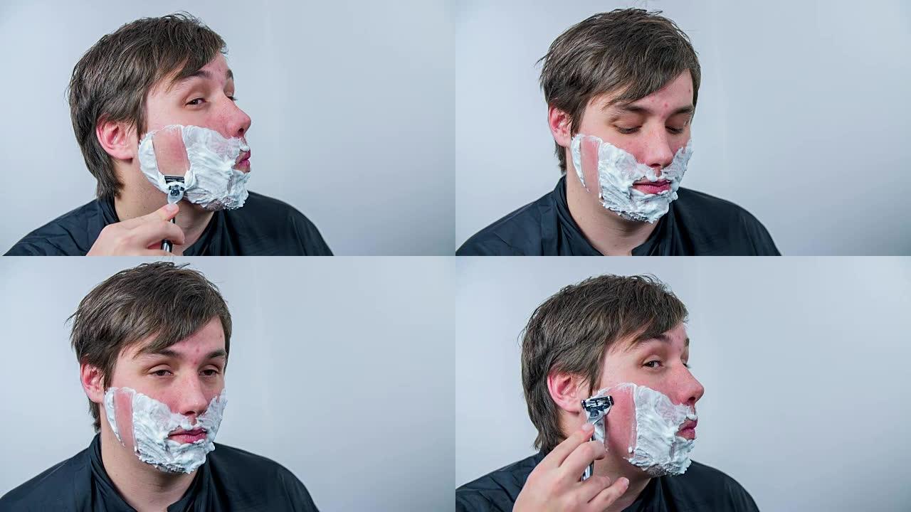 男人正在刮脸