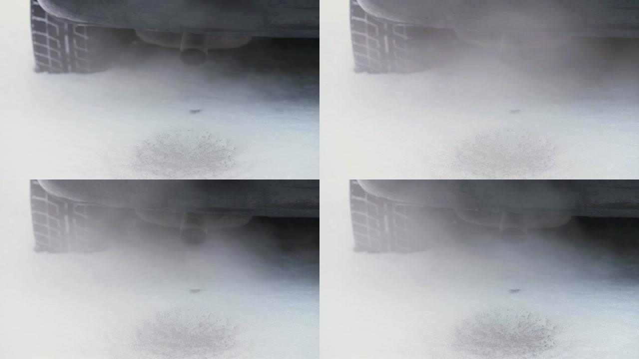 柴油动力汽车有毒废气从白雪上的排气管排放。