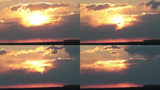 日落时间流逝通过流动的云层，山太阳黎明