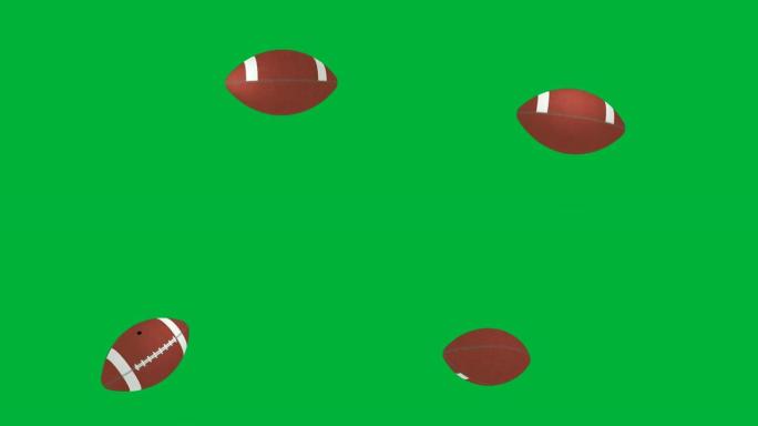 美式足球落在绿色色度关键背景上