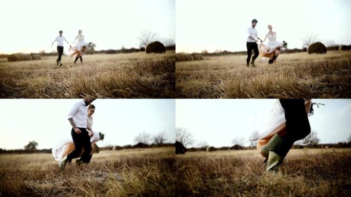 一对已婚夫妇的慢动作在草地上奔跑