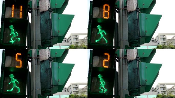 城市交通灯的运动为行人行走打开绿色