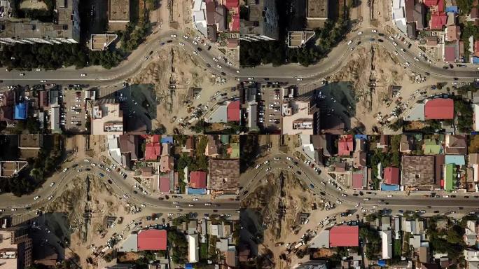 运输路口、交通交叉路、建筑路的4k夏季航拍画面，从上方看环线。