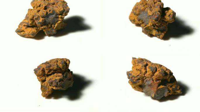 白底旋转的赤铁矿矿物石样品