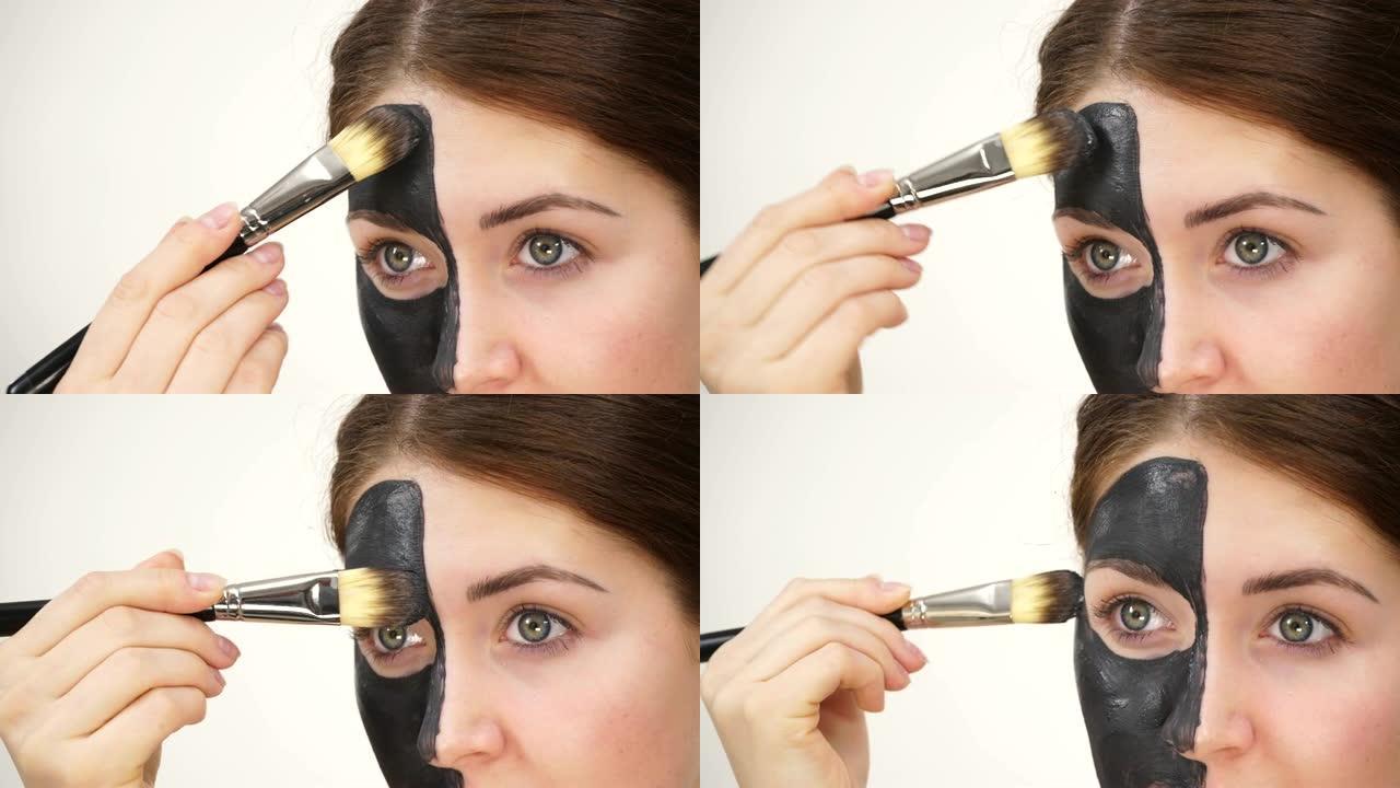 女人在脸上涂黑色碳面膜