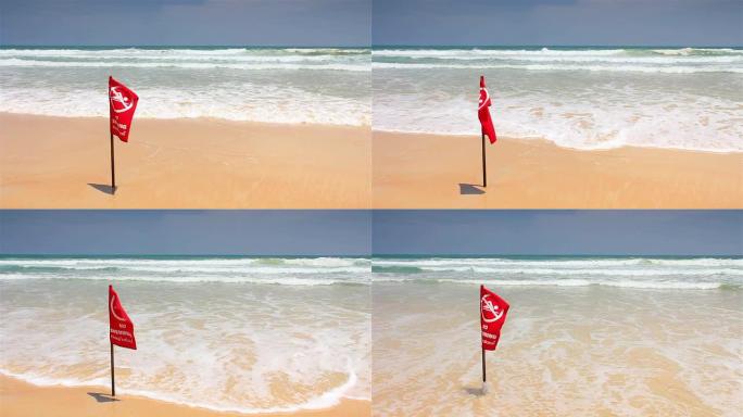 风暴的季节。海滩上悬挂红色警告旗，禁止游泳