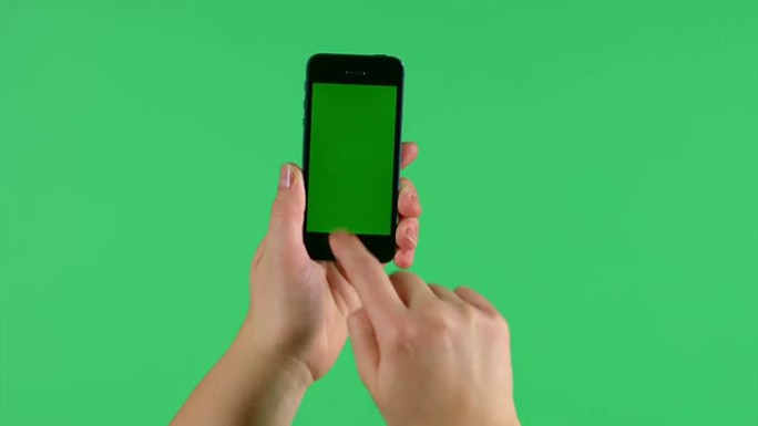 智能手机在绿色屏幕上轻按，滑动，展开和捏手势