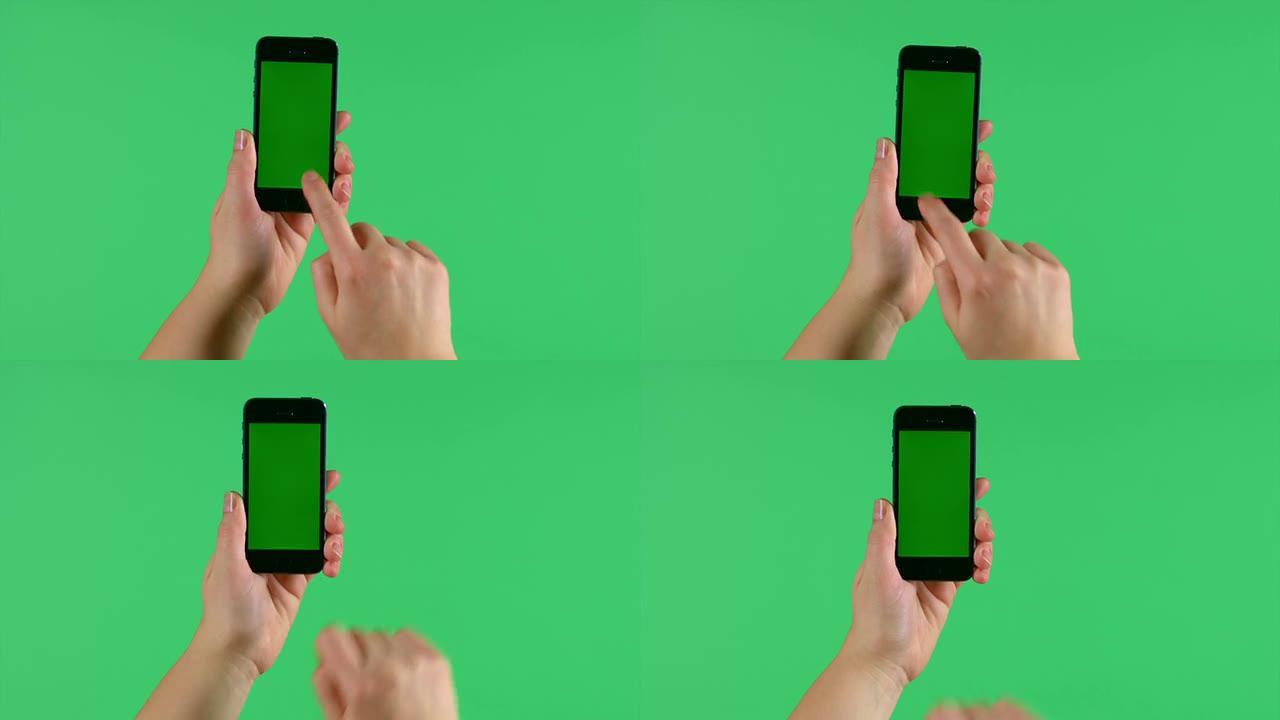 智能手机在绿色屏幕上轻按，滑动，展开和捏手势