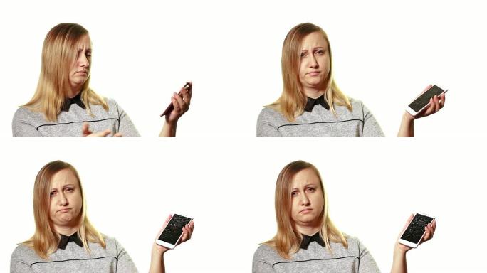 坏掉的小工具的概念。失意的女人在智能手机破碎的屏幕上展示她的手。