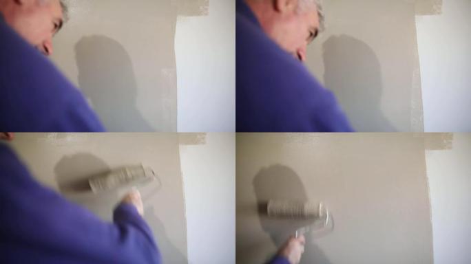 房屋画家绘画住宅住宅室内灰色，带油漆滚筒