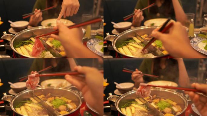 手用筷子吃食物，寿喜烧，sha锅