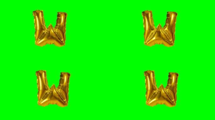大字母W来自漂浮在绿色屏幕上的字母氦气黄金气球