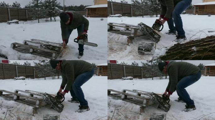 冬天，一个大胡子的男人电锯在私人住宅的院子里锯木头。一名男子在冬天为房屋供暖准备柴火。