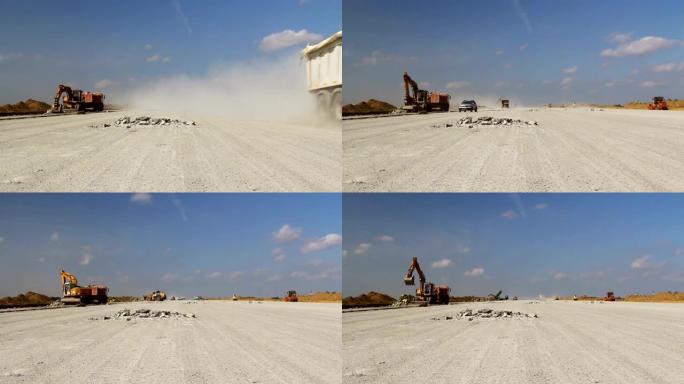 在机场跑道上工作的重型建筑设备