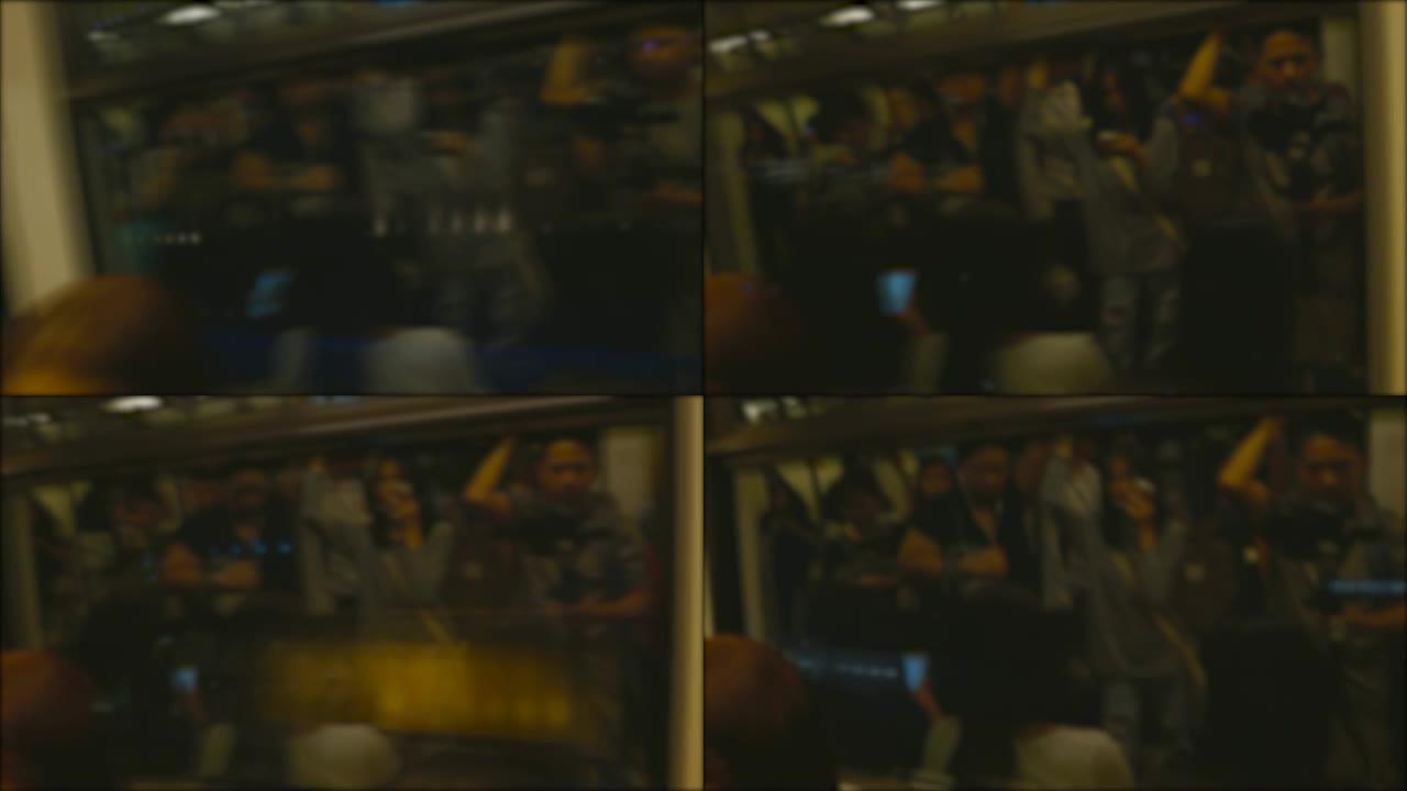 过度失误和长时间暴露，使曼谷中央火车站的人群模糊。