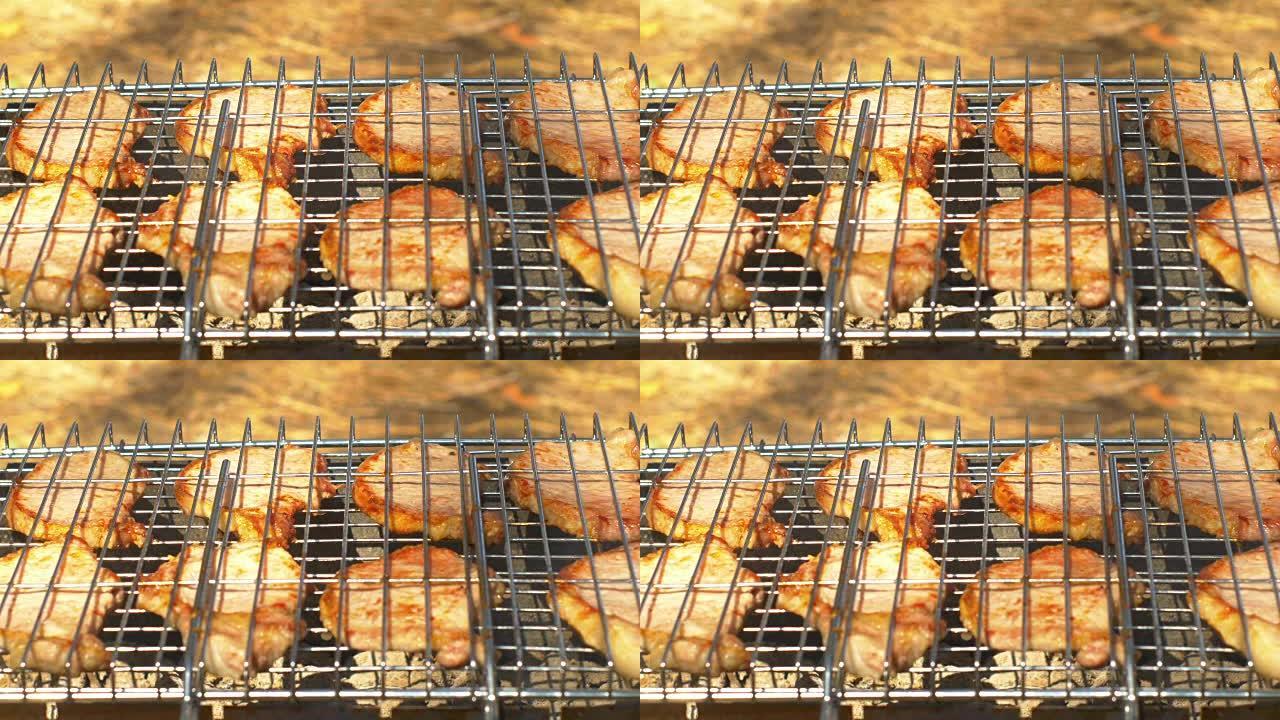 火盆上的烤猪肉牛排，侧面视图