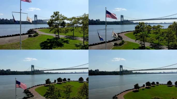 背景是新泽西州李堡的乔治华盛顿大桥的美国国旗鸟瞰图。