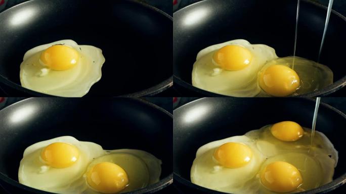 三个鸡蛋在锅里碎了。特写