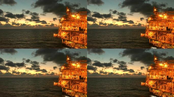 海上油气平台，中央处理平台在日落时间生产的原料气和凝析油或原油，然后将天然气输送到陆上炼油厂